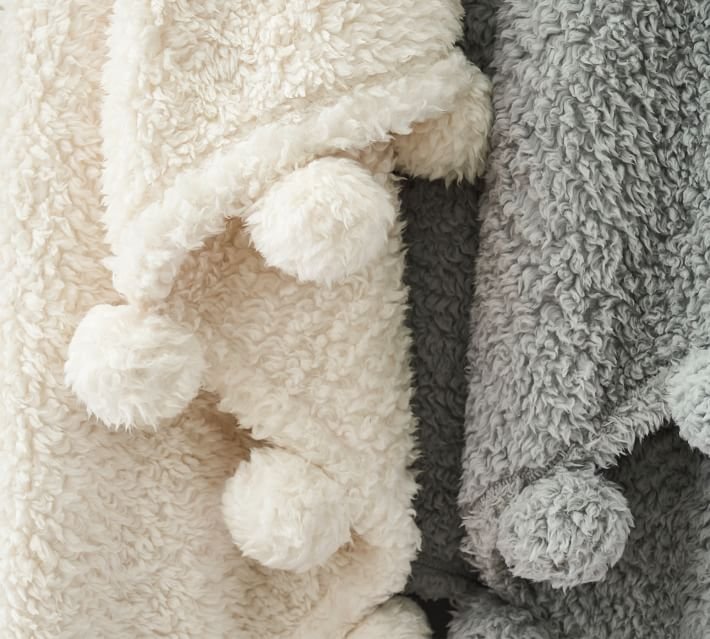 cozy-pom-pom-sherpa-throws-o.jpg